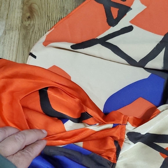 Vibrant Red and Blue Caped Jumpsuit with Abstract Print - Picture 4 of 8